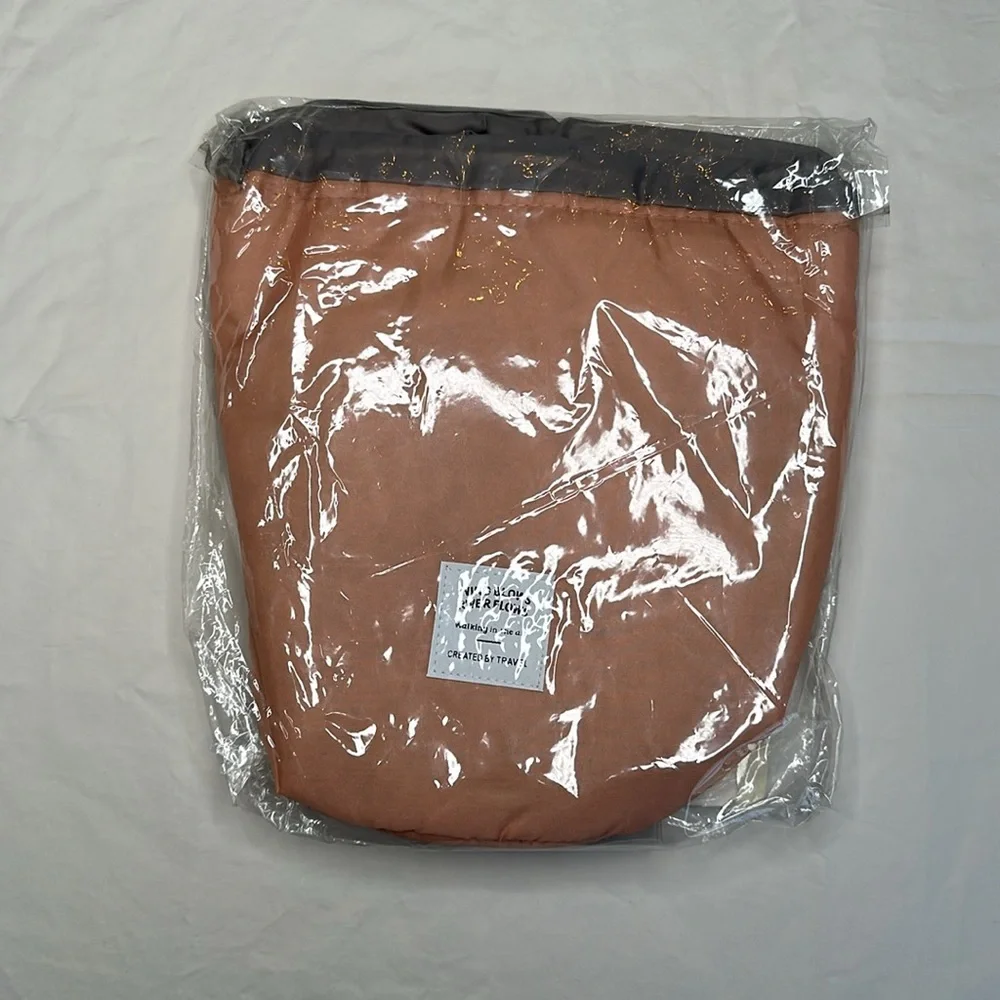 BRAND NEW WITH TAGS! Pink and Gray Women's drawstring travel cosmetics pouch.